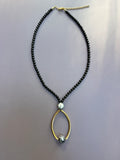 The Gilded Orbit Necklace