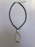 The Gilded Orbit Necklace