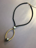 The Gilded Orbit Necklace