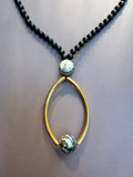 The Gilded Orbit Necklace
