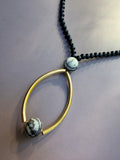 The Gilded Orbit Necklace