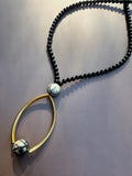 The Gilded Orbit Necklace