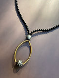 The Gilded Orbit Necklace