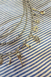 D106 - Antiqued Silver Multi-Strand Charm Necklace