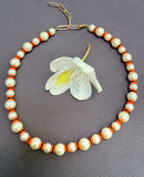 D143- Orange Striped Pearl Necklace