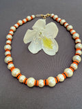 D143- Orange Striped Pearl Necklace