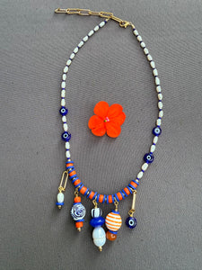 The Pearl Parade Charm Necklace