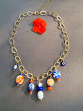 The Tangerine Trinkets Charm Necklace