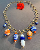 The Tangerine Trinkets Charm Necklace