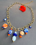 The Tangerine Trinkets Charm Necklace