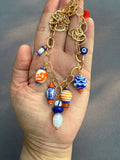 The Tangerine Trinkets Charm Necklace