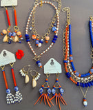 The Tangerine Trinkets Charm Necklace