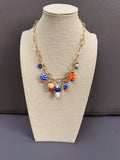 The Tangerine Trinkets Charm Necklace